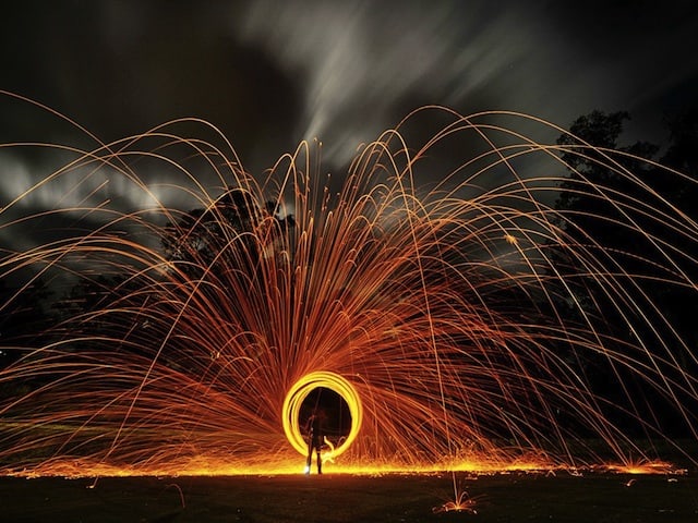 shower of sparks, night, National Geographic, circle of sparks