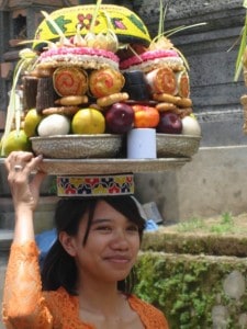 Balinese woman bringing offerings to a temple